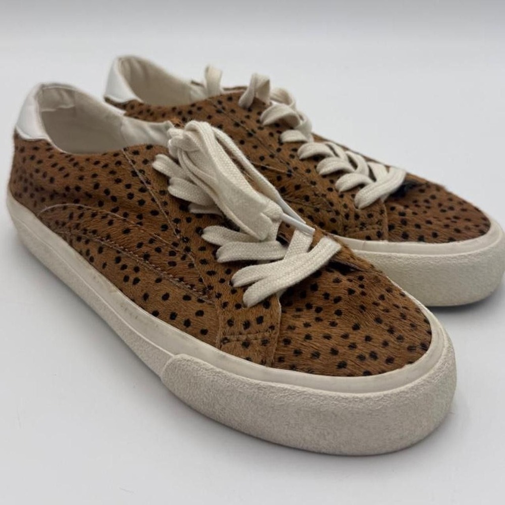Brown leopard print sneakers with black polka dots